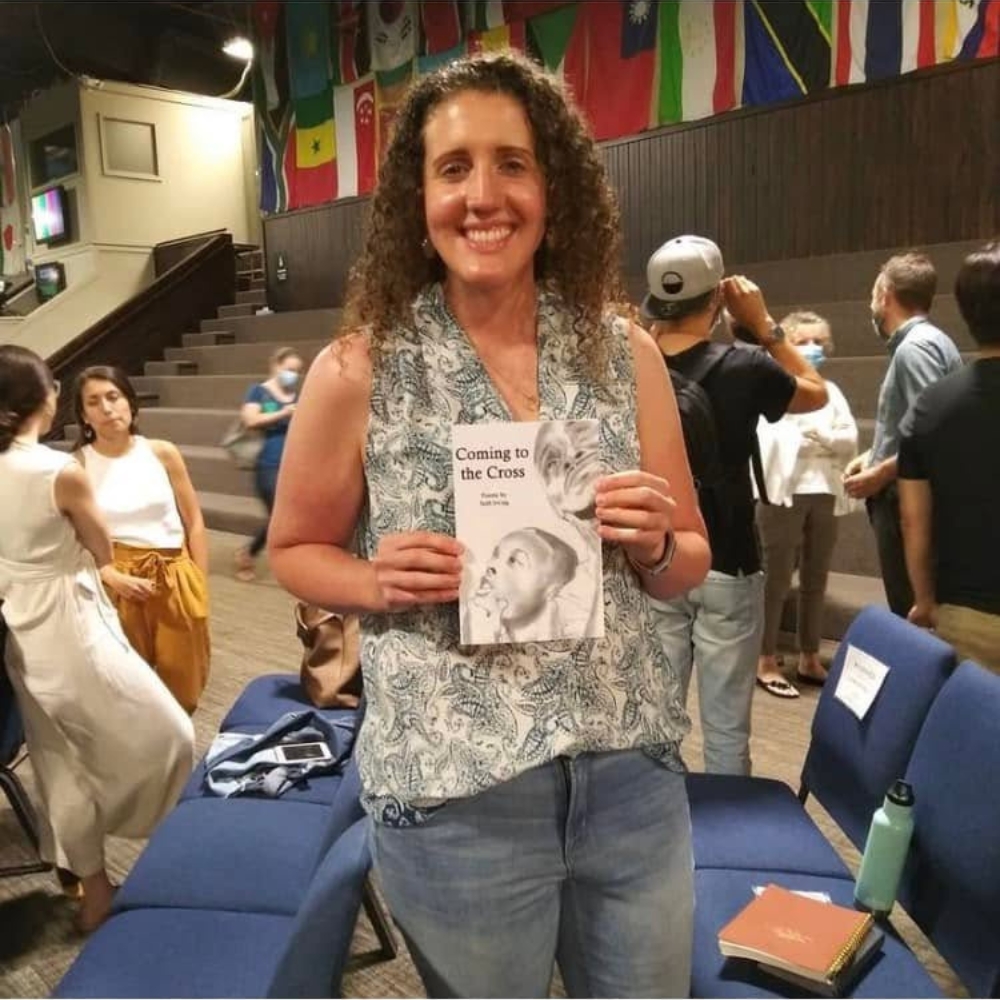 Reader holding Seth Irving's book