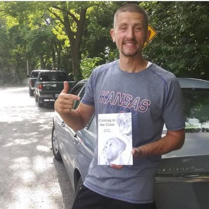 Reader holding Seth Irving's book